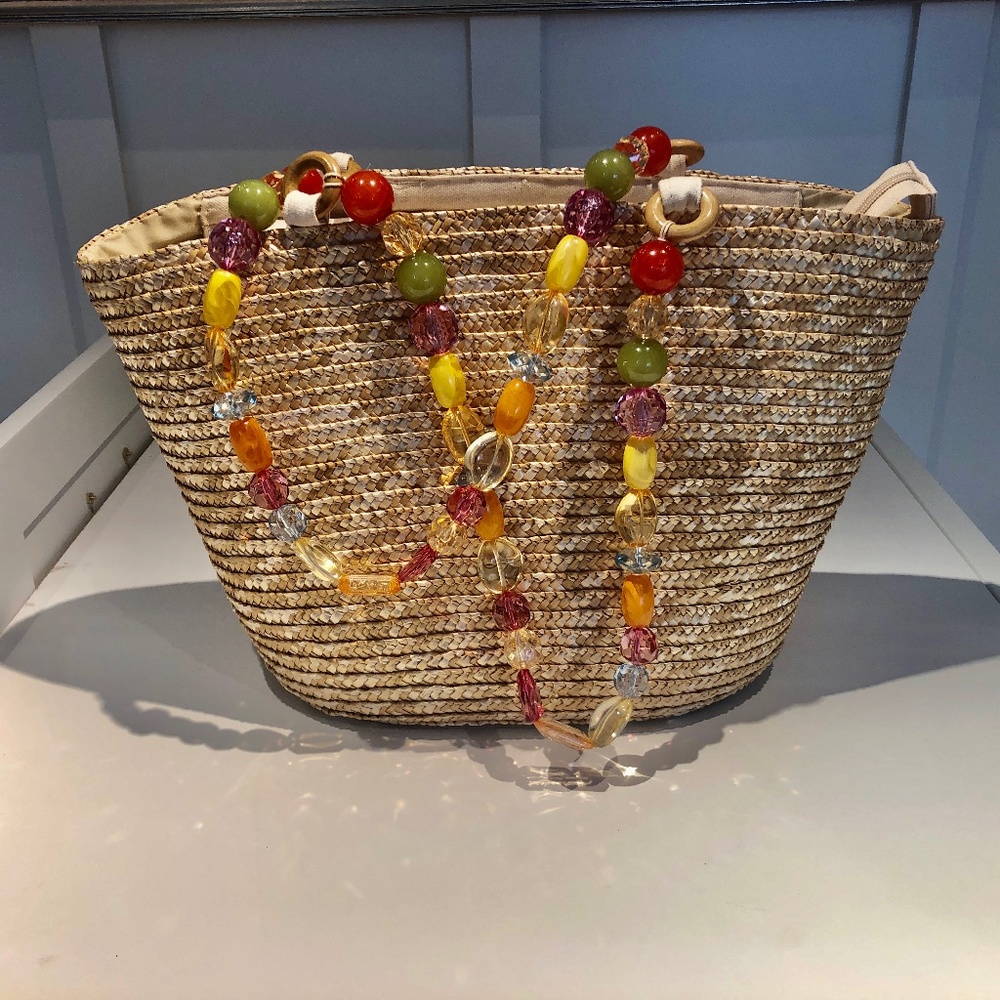 Neutral woven purse with plastic beaded handles